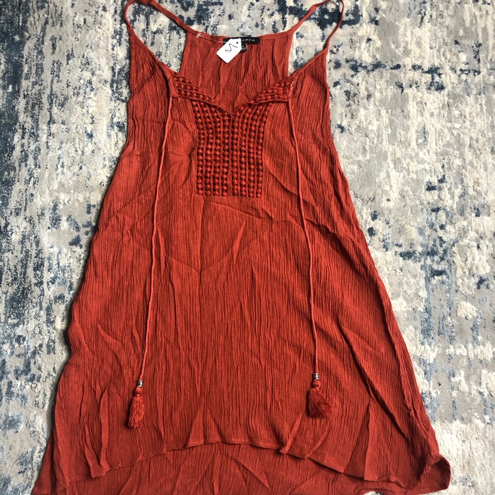 orange flowy tank